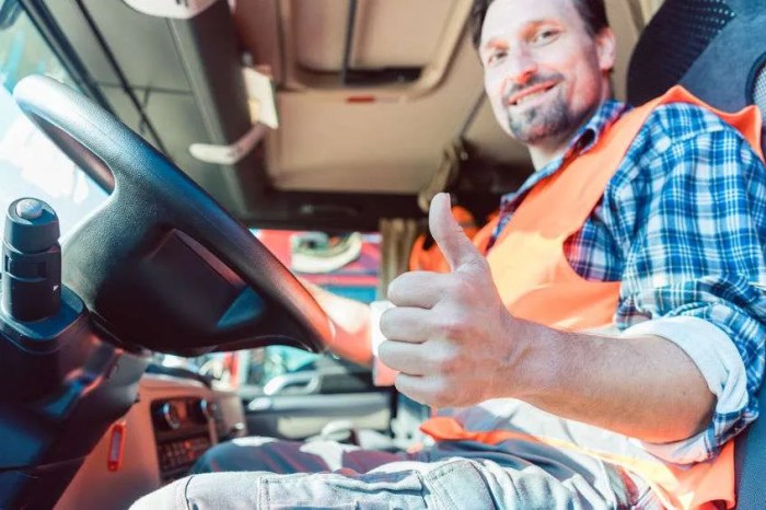 A truck driver is attempting to deliver some furniture